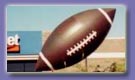 Advertising Inflatables - giant Football helium balloons for sale and rent!