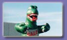 Advertising Inflatables - Giant Green Godzillas for sale or rent - Great Attention Getters!